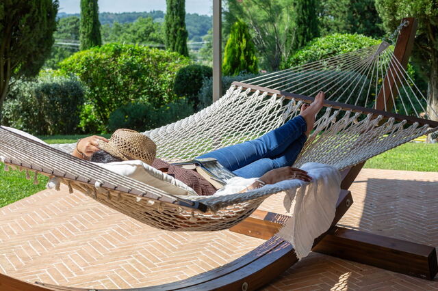 Relajándose en el jardín de Podere i Poggi