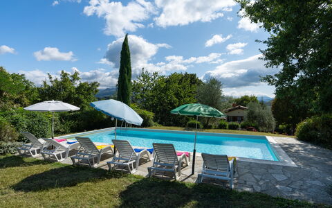 Casa Corella: Nube, Cielo, Planta, Agua, Paraguas, Edificio, Piscina, Árbol, Sombra, Casa