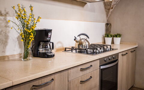 Appartamento La Corte: Gabinetes, Mostrador, Planta, Propiedad, Fregadero, Cocina, Grifo, Lavabo, Diseño De Interiores, Edificio