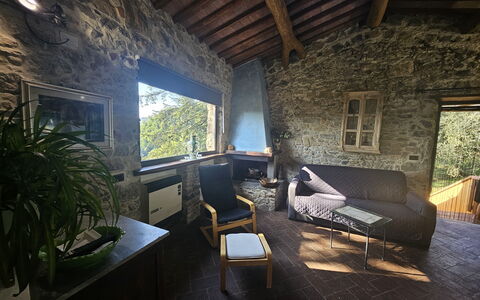 Il Nido: Pared, Mueble, Silla, Cabaña, Pared De Piedra, Sala, Material Natural, Sofá, Mesa De Café