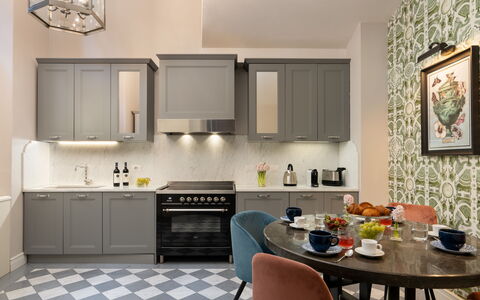 Pazzi Penthouse Luxury Apartment in Florence by Pa: Mueble, Gabinetes, Propiedad, Mostrador, Mesa, Lavabo, Diseño De Interiores, Madera, Silla, Piso