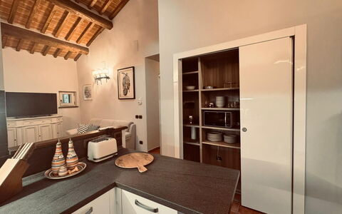 Casa Castelli: Diseño De Interiores, Piso, Mueble, Madera, Techo, Mostrador, Gabinetes, Cocina, Suelo, Encendiendo