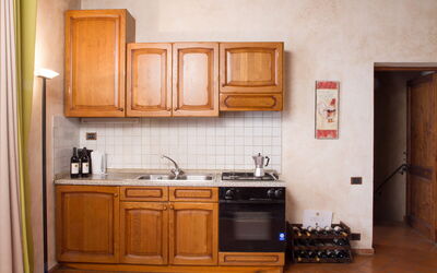 Loggia Apt. del: Cocina, Aparato De Cocina, Mostrador, Madera, Electrodoméstico, Diseño De Interiores, Mueble, Gabinetes, Piso, Fregadero