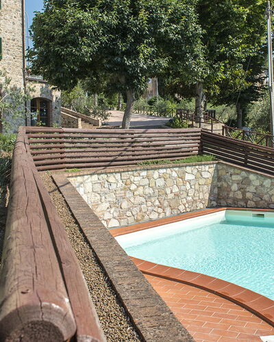 Casa Elia 6: Pared, Arquitectura, Hacienda, Jardín, Piscina, Inmuebles, Paisajismo, Ladrillo, Villa, Yarda