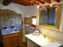 Bathroom with a sink in real travertine